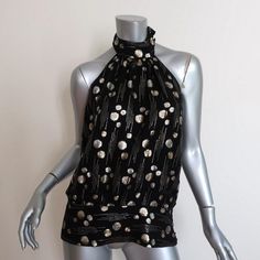 Gently worn. Great condition. No flaws. Polka Dot Sleeveless Party Top, Chic Polka Dot Evening Tops, Chic Polka Dot Tops For Evening, Fitted Polka-dotted Blouse For Night Out, Fitted Polka Dot Blouse For Night Out, Elegant Polka Dot Evening Top, Elegant Evening Polka Dot Top, Elegant Polka Dot Tops For Night Out, Open Back Blouse