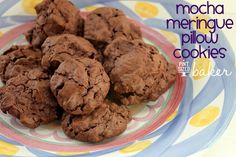 chocolate mocha meringue pillow cookies on a plate with the words baker above it