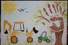 a child's handprint is shown in front of a tree with tractor wheels