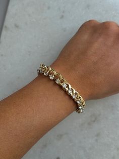 This chunky gold Jackie Bracelet features elegant clear stone detailing for a touch of sophistication. The adjustable length provides versatility for any wrist size. Elevate your look with this statement piece! Loungewear Summer, Clear Stone, Dresses By Length, Elevate Your Look, Sneaker Heels, Shoe Sale, Dress With Boots, Set Dress, Statement Pieces