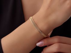 🌟 14K Gold Double Curb Link Chain Bracelet (Vienna Bracelet) 🌟 Elevate your style with the 14K Gold Double Curb Link Chain Bracelet, also known as the Vienna Bracelet. This luxurious piece features a double curb link design that adds extra dimension and sophistication to the classic curb chain style. Its bold yet elegant look makes it the perfect accessory to complement both casual and formal outfits. ✨ With an adjustable length from 6 to 8 inches, the Vienna Bracelet ensures a perfect fit and Gold Jewelry Bracelet, Link Design, Gold Armband, Jewelry Bracelets Gold, Link Chain Bracelet, Formal Outfits, Gold Bracelet For Women, Jewelry Bracelet, Formal Outfit