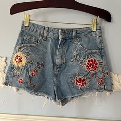 Size Uk 6, Us 2. Ripped Jean Super Short Hot Shorts. Never Worn. Floral Embroidery. The Waist Is 12 Inches Flat. (Would Best Fit A Size 24!) Trendy Embroidered Mid-rise Bottoms, Embroidered High Rise Blue Bottoms, Casual Embroidered Cutoff Shorts, Trendy High-waisted Embroidered Bottoms, Embroidered High Waist Cotton Jean Shorts, High Waist Embroidered Bottoms For Spring, Embroidered High Rise Denim Shorts, Blue Cutoff Jean Shorts With Floral Embroidery, High-rise Embroidered Denim Shorts