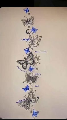 a drawing of butterflies on a white wall with blue writing in the bottom right corner