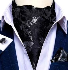 Looking for that sophisticated touch to turn heads and leave a lasting impression? Look no further than this Silk Ascot and Pocket Square Set with Woven Cufflink Set! It is crafted with the finest materials and meticulous attention to detail, ensuring you exude confidence and timeless style. Unveil timeless elegance with this meticulously crafted 3-piece ensemble, including a silk ascot, a woven pocket square, and perfectly matching cufflinks. This set is more than just an accessory; it's a statement that defines your refined taste. Perfect for a variety of occasions, from weddings and formal events to business meetings and casual parties. Don't settle for the ordinary. Elevate your look with this Silk Ascot and Pocket Square Set with Woven Cufflinks. Order yours today! Key Features: Luxur Black Jewelry For Business On Father's Day, Black Suit And Tie Accessories For Father's Day Gift, Black Suit And Tie Accessories For Father's Day, Classic Silver Cufflinks For Black Tie Events, Classic Black Cufflinks For Father's Day, Luxury Silver Suit And Tie Accessories For Business, Silver Suit And Tie Accessories For Formal Occasions, Black Classic Wedding Cufflinks, Elegant Black Cufflinks For Business