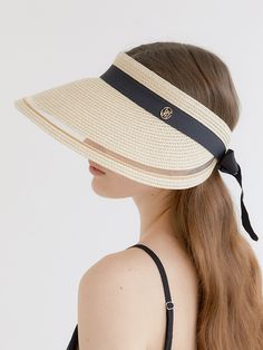 Editor's Notehalden is a brand that started with the minimalism and warm sensibility of Northern Europe.- Wide visor that can cover your face well- Brand logo pendant point- Size adjustable with ribbon around the hat- Daily point item Measurements (in.)- Head Girth: 21.26 in. ~ 23.62 in.- Depth: 1.77 in.- Visor: 4.92 in. Composition & Care- 100% Raffia- Do not wash or dry cleaning- Do not squeeze or iron- Wipe off moisture and stains with a dry cloth with little moistureDesigner- b Elegant Adjustable Visor Sun Hat, Packable Adjustable Visor, Spring Adjustable Packable Visor, Packable Wide Brim Adjustable Visor, Adjustable Visor With Uv Protection, Elegant Adjustable Visor Hat, Lightweight Adjustable Visor, Adjustable Packable Visor Hat, Beige Packable Visor Hat