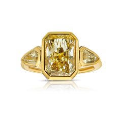 a fancy yellow diamond engagement ring