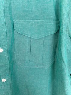 "-Description- >Claiborne men's teal button down shirt >new old stock - original tags still attached >button down >collared >two flap close pockets on the front >size medium/large - tag marked a medium but chest measurement is more like a large, please check all measurements before purchase >so preppy! >condition: new old stock - original tags still attached >color(s): teal >fabric(s): 100 cotton >brand: claiborne >care: machine wash -Measurements- >size: s Green Unstructured Cotton Shirt, Unstructured Green Cotton Shirt, Classic Green Shirt With Pockets, Green Button-up Camp Shirt With Pockets, Classic Green Camp Shirt With Button Closure, Green Button-up Camp Shirt, Green Relaxed Fit Camp Shirt With Buttons, Classic Green Cotton Camp Shirt, Green Cotton Button-up Camp Shirt