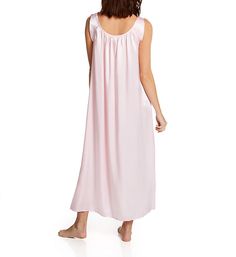 Enjoy the silky smooth comfort of this lustrous satin nightgown as you lounge and sleep. Flattering scoop neckline. Ruching along the neckline at front and back adds fullness. Sleeveless. Non-adjustable shoulder straps have overlapping detail at top. Relaxed styling provides a comfortable fit. Pullover styling. Perfect for warm weather sleep or lounge. Made in the USA. Amanda Rich Women's Satin Banded Sleeve Long Gown in Light Pink | Size XS | HerRoom.com Feminine Sleepwear With Satin Finish, Feminine Satin Nightgown For Sleep, Feminine Silk Nightgown For Sleep, Feminine Satin Finish Sleepwear For Night, Silk Sleepwear With Satin Finish For Wedding Night, Silk Satin Finish Sleepwear For Night, Silk Satin Finish Sleepwear, Feminine Satin Nightgown For Bedtime, Satin Nightgown With Bias Cut For Sleep