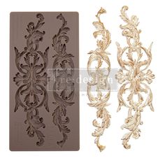 two chocolate molds with decorative designs on the front and back of each cookie sheet