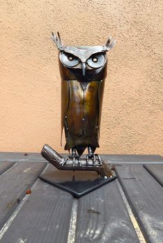 Handmade, welded steel owl perched on a log and steel plate base. Entire sculpture is 18 gauge steel, and steel rod and tubing. Brown and black patina with clear coat to protect finish. Measures 12 inches high, 7 inches wide (at base), 7 inches deep (at base). Weight is apx. 5 pounds. Made in Arizona, USA by seller. Carved Owls Wood Sculpture, Recycled Metal Art, Owl Sculpture, Owl Crafts, Arizona Usa, A Log, Steel Rod, Owl Art, Recycled Metal