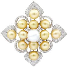 18K white gold pearls and diamonds brooch features 5.00 cts of diamonds and 1 white pearl in the middle and 12 champagne color pearls 11-14mm. White Diamond Pearl, Brooch Diamond, Antique Brooches, Color Champagne, Diamond Brooch, Champagne Color, Pearl Diamond, Lovely Jewellery, Champagne Gold