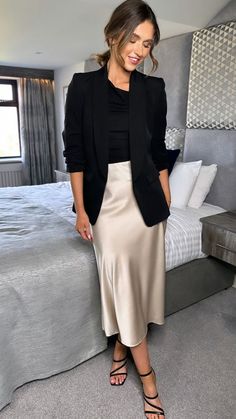 Sizing info: Our model Lauren is wearing a UK 8 and she is wearing the size S in this skirt. Size S = UK 8-10. Size M = UK 10-12. Size L = UK 12-14. Make an impact in this stunning Yaella Beige Midi Skirt. Crafted with a sleek, beige fabric, this midi skirt adds a sophisticated edge to any look. Show off your style and Tan Skirt White Top Outfit, Beige Silk Skirt Outfit Summer, Sleek Womens Fashion, Outfits Con Beige, Business Chic Outfits Professional Women, A Line Midi Skirt Outfit, Skirt Business Outfit, Beige Black Outfit, Beige And Black Outfit