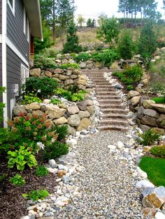 a stone path leading up to a house