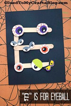 an eyeball game made out of paper with the words e is for eyeball on it