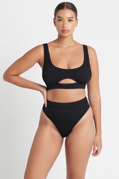 Sporty, sexy, and super supportive, the Sasha Top takes everything we love from our classic Malibu crop but with an underbust cut-out for an eye-catching twist. Designed + made in Australia, the Sasha is built to flatter, made from our unsized bound crinkle, which accentuates your curves in all the right places. Modern Seamless Swimwear For Summer, Modern Solid Color Seamless Swimwear, Modern Seamless Swimwear For Beach, Modern Solid Color Swimwear With Seamless Construction, Modern Solid Swimwear With Seamless Construction, Trendy Solid Seamless Swimwear, Trendy Solid Color Swimwear With Seamless Construction, Trendy Solid Swimwear With Seamless Construction, Modern Seamless Swimwear For Poolside