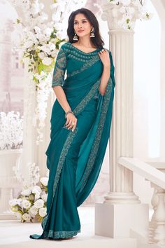 Step into the festive season with elegance in the Reach Color Festive Wear Embroidered Saree. Crafted with attention to detail, this saree features delicate embroidery that elevates its overall appearance. The rich colors are ideal for celebratory moments, providing you with a radiant look. Made from high-quality fabric, it promises lasting comfort and grace. Perfect for special events, this saree allows you to express your style with confidence. Team it up with traditional bangles and a necklac Net Blouse, Net Blouses, Crepe Saree, Teal Blue Color, Heavy Work