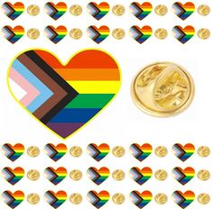 a heart shaped pin surrounded by rainbow colored hearts and gold buttons on a white background