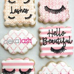 decorated cookies with the words hello beautiful and eyelashes on them are shown in different colors