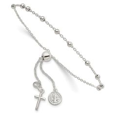 A sterling silver beaded lariat bracelet with a dangling cross on one side and St. Benedict medallion on the other. Bolo Bracelet, Trending Engagement Rings, St Benedict, Saint Benedict, Rosary Bracelet, Engagement Rings Bridal Sets, Fine Jewelry Bracelets, Religious Jewelry, Gemstone Bracelets