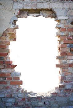 an open window in the side of a brick wall