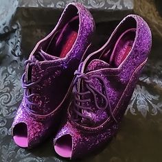 Pleasure Usa Bordello Purple Glitter Lace Up Stilettos Ready For A Night On The Town. Women's Size 9 And Nearly 4" Stilettos. Never Worn, As Shown By The Picture Of The Shoe Bottoms. In Original Packaging, Including A Protective Bag For Each Shoe And A Separate Travel Bag To Hold Both Shoes. Fitted Open Toe Glitter Heels, Glamorous Purple Closed Toe Heels, Glamorous Purple Party Heels, Glitter Open Toe Heels, Glamorous Fitted Purple Heels, Purple Party Heels, Purple Glitter High Heels, Glitter Stilettos, Shoes Purple