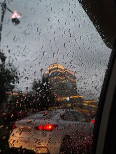 rain drops on the windshield of a car