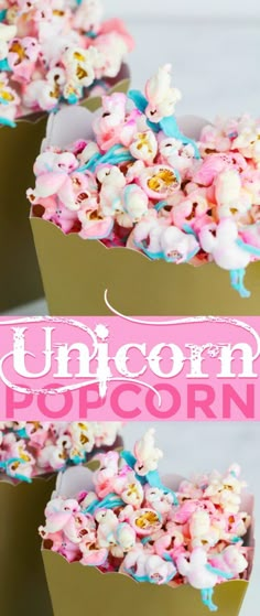 three cups filled with unicorn popcorn on top of a table