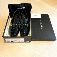 Excellent Used Condition, Wore Twice. From The 22s Collection. Patent Leather With Signature Chanel Chain And Cc Charm. 1.5” Heel, Perfect Shoe For Work! Minimal Scuffing At Soles. Rubber Soles At Heels. Small Scuff At Right Inner Heel Shown In Last Photo. Fits 8.5 True To Size Without Socks. Box And Dust Bags Included. Made In Italy. Sorry, No Bundling. Chanel Chain, Perfect Shoes, Chanel Shoes, Work Shoes, Flat Shoes Women, Loafer Flats, Patent Leather, Calf Skin, Dust Bag