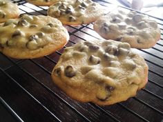 chocolate chip cookies cooling on an oven rack