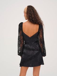 Unveil your romantic side with the Gisela patchwork mini dress—a little black dress crafted in a rose jacquard satin and delicate lace. The intricate patchwork design, adorned with pintucks and ruffles throughout, adds an irressistance charm, while the deep V neckline and billowy long sleeves give this short black dress a dreamy, romantic touch. Short Black Dress, A Little Black Dress, Black Short Dress, Dress Crafts, Patchwork Designs, Pin Tucks, The Deep, A Rose, Mini Black Dress