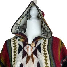 Stay cozy and fashionable this season with our fall apparel, perfect for layering over any outfit. Don't miss out on the must-have item of the season - the alpaca poncho! - Very soft and warm- Large and long perfect for the coldest wintertime- Lightweight cape- Comfortable shawl- With fringes and geometric patterns - Made of alpaca wool and acrylicMeasurements: Length from shoulder to bottom: 39 inches + 1 inch fringesWidth from left to right: 48 inchesCare instructions:- Hand wash in cold water Cozy Hooded Poncho For Outdoor, Casual Winter Poncho For Outdoor, Cozy Brown Hooded Poncho, Brown Long Sleeve Poncho For Outdoor, Casual Outdoor Poncho, Casual Long Sleeve Poncho For Outdoor, Cozy Alpaca Poncho For Winter, Bohemian Hooded Poncho For Fall, Bohemian Alpaca Outerwear For Fall