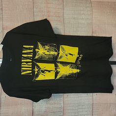 Nwot Awesome Black And Yellow Nirvana In Utero Graphic Design Tshirt. In Utero Was The Third And Final Album By Nirvana Released On September 21st, 1993. P2p Is 20" And Shoulder To Bottom Is 29". In Outstanding New Condition!! Size Large. Please Check Out My Closet, And Consider Bundling For Additional Savings. Thank You For Poshing With Me. Free Gift With Every Purchase Graphic Design Tshirt, Nirvana In Utero, Nirvana Shirt, In Utero, Design Tshirt, Graphic Tshirt Design, Black And Yellow, Design T Shirt, Nirvana