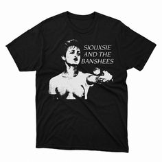 a black t - shirt with a woman pointing at the camera and text that reads, squise and the banshees