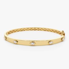 Elevate your wrist's allure with our Diamond Gold Bangle Bracelet, featuring five stunning marquise diamonds. Crafted in 14K gold, this Bangle Cuff Bracelet exudes elegance and sophistication. Embrace the unique charm of our Evil Eye Diamond Bracelet, a perfect addition to your collection, and enhance your style with this Ladies Gold Bangle Bracelet, a timeless and captivating choice. ▶Item Details * Made to Order * Gold KT: 14K Solid Gold (also available in 18K  upon request) * Custom Gold Color: Rose Gold, Yellow Gold, White Gold * Width: 4 MM * Marquise Shaped Diamonds: 5 pcs 4 x 2 MM * Total CTW: 0.30 Ctw * Diamond Color Clarity: G Color SI Clarity * Ready to Ship in 7-10 Business Days ▶ See more of our Diamond Bracelets - http://etsy.me/2mVrAB5 ▶ See our storefront here - http://etsy. Marquise Yellow Gold Bracelets For Formal Occasions, Fine Jewelry Gold Marquise Bracelets, Elegant Yellow Gold Marquise Bracelet, Gold Hand-set Diamond Bangle Bracelet, Luxury Marquise Yellow Gold Bracelets, Yellow Gold Diamond Bangle Bracelet Hallmarked, Yellow Gold Diamond Accents Cuff Bangle, Luxury Marquise Yellow Gold Bracelet, Yellow Gold Diamond-accented Cuff Bangle