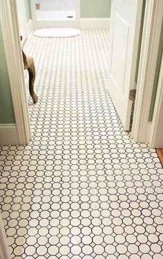 an image of a tiled floor in the hallway