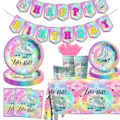 a birthday party set up with pink and blue decorations, plates, napkins, and cupcakes