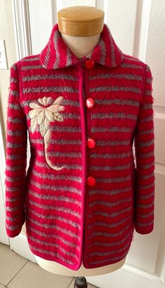 The cutest vintage Mohair striped jacket. Size Medium, made in Korea, 1960s/70s, beautiful condition, fully silk lined, sleeves lined as well.  Gray and pink striped mohair with raspberry colored corded piping, original pink plastic buttons all in tact.  Thick mohair shag makes it cozy for chilly weather, silk lining keeps it cool & comfortable to wear. Cute peter pan collar, unique vintage buttons & floral design embroidery/appliqué on right side.   Approximately a size 8 or medium Shown on a s Winter Striped Outerwear With Buttons, Vintage Striped Winter Outerwear, Winter Striped Wool Outerwear, 70s Jacket, Cozy Coats, Raspberry Color, Design Embroidery, Pink Plastic, Striped Jacket