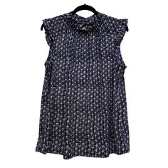 Nwt Adrianna Papell Ruffle Mock Neck Tank Sleeveless Career Top In Navy And White Fancy Flower Back Button Closure Stretchy Knit Fabric Size Large Measurements Bust 42”, Length 26” Smoke Free / Pet Free Home Blue Sleeveless Ruffled Tops, Blue Sleeveless Blouse For Daywear, Blue Ruffled Sleeveless Blouse, Sleeveless Floral Print Blouse For Work, Heart Print Blouse, Crochet Long Sleeve Tops, Black Lace Shirt, Lace Sleeve Blouse, Mock Neck Tank