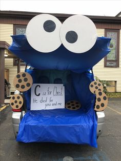 a car that is decorated to look like a cookie monster