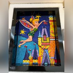 a stained glass window with a tinker fairy on it