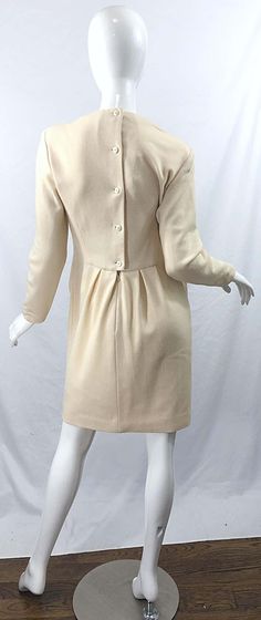 For Sale on 1stDibs - I had this chic vintage GEOFFREY BEENE for Bergdorf Goodman dress once, and it sold right away ! There are so many details that went into designing this Elegant Beige A-line Vintage Dress, Elegant A-line Vintage Dress With Buttons, Elegant Long Sleeve Vintage Dress For Formal Occasions, Elegant Cream Dress With Buttons, Chic Fitted Vintage Dress In Beige, Cream Formal Dress With Buttons, Chic Fitted Beige Vintage Dress, Formal Cream Dress With Buttons, Classic Vintage Dress For Vintage Events