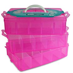 three pink plastic storage boxes with handles and dividers on the top one is empty