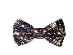 Dark Purple with Gold/Black Print Brocade. Whether this bow tie is worn with a suit, a tuxedo or shirt with jeans, it will make a great fashion statement. This classic bow tie is hand sewn, features a fully adjustable strap with metal hardware and is lined with fusible interfacing which ensures the bow tie will hold its shape for years to come.  This quality bow tie looks sharp when worn and is constructed to last! My bow ties are made with an array of stylish fabrics that vary from classic, trendy, up to date prints to vintage, holiday and fun filled prints which are perfect for all occasions.   I specialize in custom requests for weddings, proms, and other special occasions.  If you have a favourite colour or print you'd like, or would like a boy/child size, just send me a convo and I wi Mens Fashion Accessories, Bow Tie Suit, Mens Bowtie, Wedding Bow Tie, Bow Tie Wedding, Fusible Interfacing, Favourite Colour, Mens Bow Ties, Mens Accessories Fashion