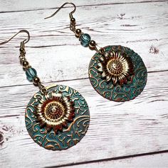 Verdigris Boho Sunflower Dangle Earrings, Gold Tone, Brand New Smoke Free And Pet Free Home. I Ship Tuesday Through Saturday Except For Holidays. Bohemian Sunflower Drop Earrings, Bohemian Sunflower Design Flower Earrings As Gift, Bohemian Sunflower Earrings For Gift, Bohemian Sunflower Design Earrings For Gift, Bohemian Sunflower Earrings As Gift, Bohemian Flower-shaped Metal Earrings, Bohemian Metal Flower-shaped Earrings, Boho Sunflower, Dangle Earrings Gold