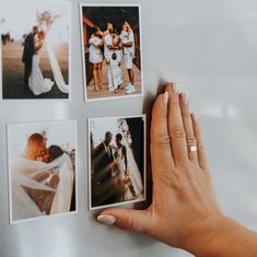 a person holding up four polaroid photos with their wedding pictures on them and the bride's dress blowing in the wind