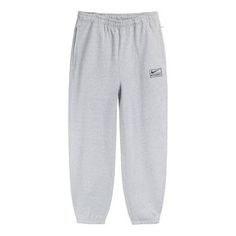 The Nike x Stussy Crossover SS22 Solid Color Logo Alphabet Embroidered Athleisure Casual Sports Pants Us Edition Unisex Gray is a must-have for any athleisure wardrobe. This unisex piece features an embroidered alphabet logo for a unique look, and the solid gray colorway is perfect for any occasion. The lightweight fabric is designed to keep you comfortable during any activity, and the adjustable drawstring waistband ensures a perfect fit. Inspired by the classic Nike x Stussy collaboration, this piece is perfect for any fan of the series. Get ready for any activity with the Nike x Stussy Crossover SS22 Solid Color Logo Alphabet Embroidered Athleisure Casual Sports Pants Us Edition Unisex Gray. (Casual/Unisex/Crossover/Embroidery/Solid Color/U.S. Edition/Gift to Boyfriend) Stussy Nike Joggers, Nike X Stussy Joggers, Nike Cotton Sweats, Nike Sweatpants With Comfort Waistband For Streetwear, Nike Winter Streetwear Pants, Nike Pants For Winter Streetwear, Nike Streetwear Pants With Comfort Waistband, Nike Gray Sweatpants For Streetwear, Nike Casual Pants For Jogging