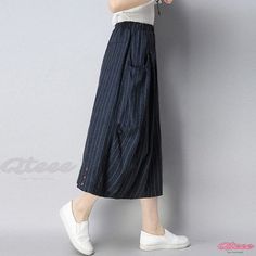 Lovely Longer Wrap Skirt for Ladies Baggy Spring Midi Skirt, Trendy Flared Skirt With Pockets, Summer Midi Skirt With Pockets, Casual Lined Skirt With Relaxed Fit, Black Relaxed Fit Midi Skirt, Casual Relaxed Fit Lined Skirt, Casual Baggy Skirt For Spring, Trendy Knee-length Flowy Skirt, Casual Knee-length Relaxed Fit Skirt