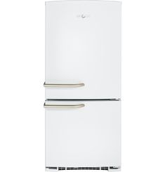 a white refrigerator freezer sitting inside of a kitchen