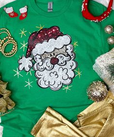 Elevate your festive wardrobe with our "Faux Sequin Santa Face Graphic Shirt" – a playful and stylish way to celebrate the holiday season. This shirt features a delightful graphic of Santa's face adorned with faux sequins. Festive Attire, Face Graphic, Santa Face, Cozy Sweatshirts, Holiday Gathering, Graphic Shirt, Graphic Shirts, Suits You, Everyday Look