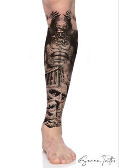 a man's leg with tattoos on it